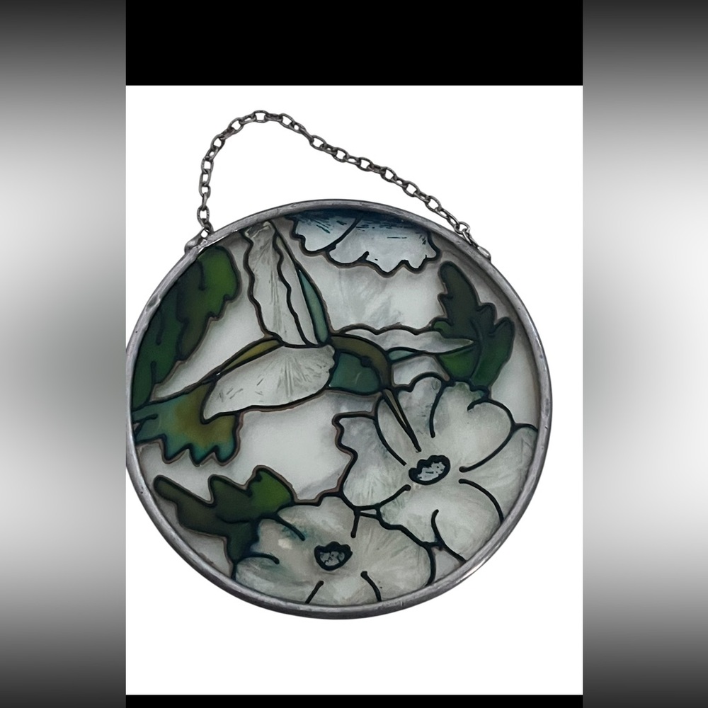 Joan Baker Designs hand-painted glass suncatcher featuring a hummingbird